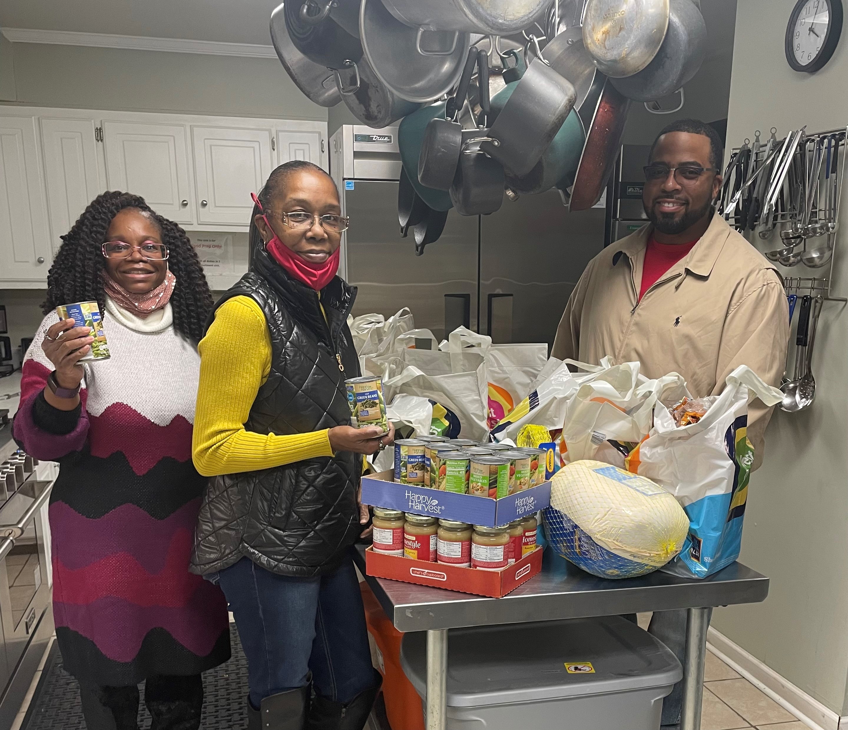 Community members donating food